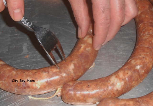 Piercing the sausage.